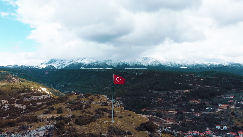 Turkish flag at the top of the mountain. turkish flag at the top at sunset Royalty-Free Stock Footage #1086977858