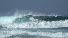 Ocean Waves. Power of waves breaking splashing sea-spray water foam 