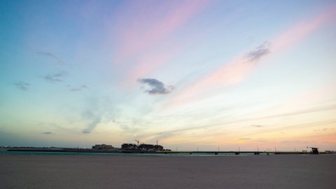 sunset sky dubai city beach island construction panorama 4k timelapse uae