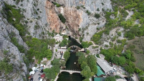Drone view of the historical ottoman monastery built on the side of the Buna river, the islamic dervish lodge built under the mountain in blagaj city mostar