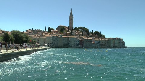 Rovinj, Croatia. - July 9, 2021. View of the city and Church of St. Euphemia from the waterfront.