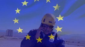Animation of european union flag over engineer and wind turbine. european union energy and economy concept digitally generated video. - Powered by Shutterstock - Get 15% off with code: PIKWIZARD15