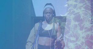 Animation of network of connections over smiling african american woman with gym bag. data processing, connections and sports concept digitally generated video.