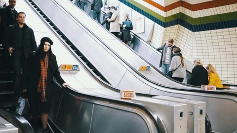 London, Uk - 01 15 2019: London Underground People Walk Escalators. People walking in the London Underground.
