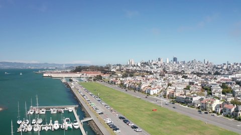 Wide aerial panning shot of the city of San Francisco from the Marina District on a clear day. 4K