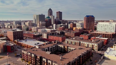 Downtown Des Moines, Iowa skyline in early fall. Drone aerial shot from southside of the metro.