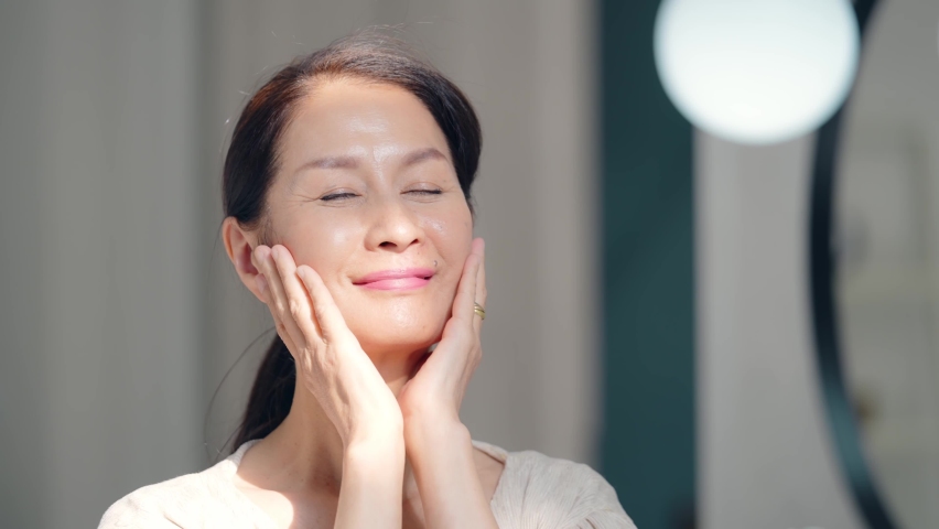 Skin care concept of Asian senior woman. Anti aging. Cosmetics. Royalty-Free Stock Footage #1087023359