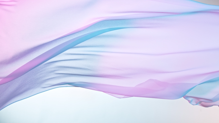 Pastel color transparent silk fabric flowing by wind, super slow motion. Fiilmed on high speed cinematic camera at 1000 fps. | Shutterstock HD Video #1087057259