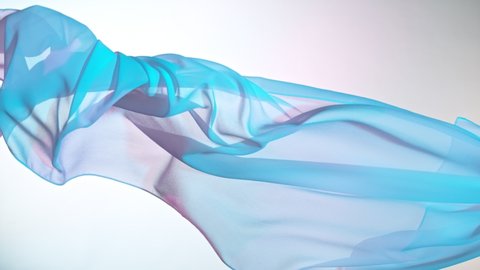 Pastel color transparent silk fabric flowing by wind, super slow motion. Fiilmed on high speed cinematic camera at 1000 fps.