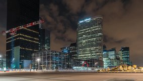 The Towers of La Defense Business District at Night Paris Game of Light and Peoples Moving