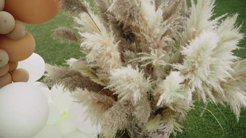 Pampas grass in a bunch at the wedding. Wedding decor.