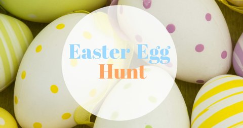 Animation of easter egg hunt text over easter eggs. easter sunday and celebration concept digitally generated video.