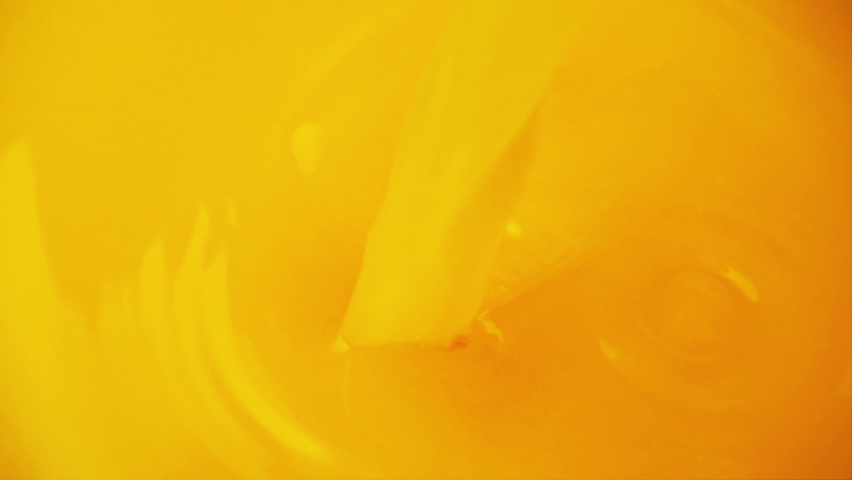 Pouring and splashing orange juice. Slow motion. - Powered by Shutterstock - Get 15% off with code: PIKWIZARD15