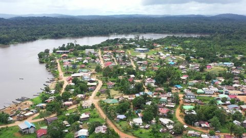 France, French Guiana, Maripasoula, drone aerial view above the village. Maroni river and Suriname country in back