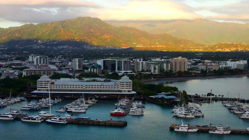 Aerial View of Harbor and Marina in Cairns, Queensland, Australia at Sunrise - drone shot