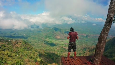 Beautiful destination Bali, Lahangan Sweet view point on top mountain with epic view on volcano Agung and rice terraces island Bali, Indonesia. 4K Aerial