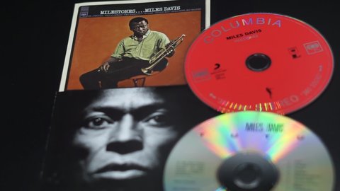 Rome, Italy - February 12, 2022, detail of two albums by Miles Davis, Tutu and Milestone blurred in the background.