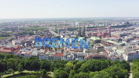 Inscription on video. Bremen, Germany. The historic part of Bremen, the old town. Bremen Cathedral ( St. Petri Dom Bremen ). View in flight. Text from small balls, Aerial View, Point of interest