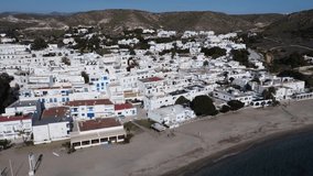 Cabo de Gata. Aerial drone view in Aguaamarga, beautiful beach and town in Almeria,Spain. 4k Drone Video