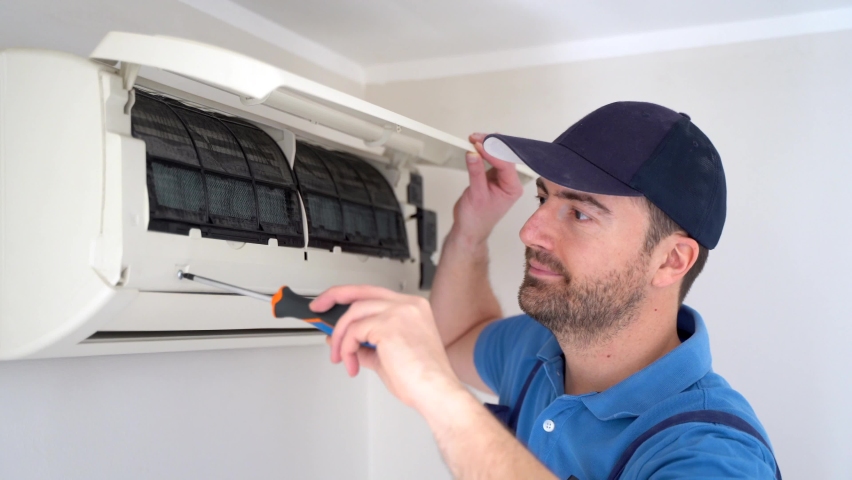 This video is about installation service maintenance of an air conditioner indoor unit Royalty-Free Stock Footage #1087137149