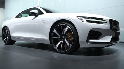 BRUSSELS, BELGIUM - JANUARY 8, 2020: Polestar 1 2-door hybrid sports car coupe in white on display at Brussels Expo. Polestar is the performance company and brand of Volvo Cars.