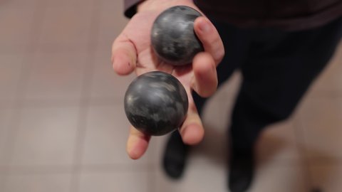 Baoding balls, qi gong chinese health balls practiced in hand, slow motion
