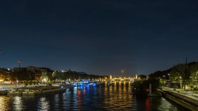 Colorful Full Moonrise at Night Over Paris Center Seine River and Bridges Docks Traffic