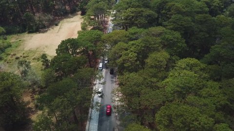 Establishing Dolly In Aerial Shot Of A Scenic Road In Baguio City