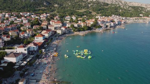 Aerial view of Croatian beach resort town of Baska on Krk Island in the Adriatic Sea