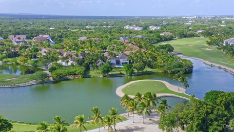 Scenic La Cana golf course with luxury villas, Punta Cana, Caribbean; drone