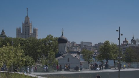 The Church of the Conception of the Righteous Anna on the Moskvoretskaya embankment against the background of the Stalin high-rise and modern buildings, Russia, Moscow - 5 july 2018