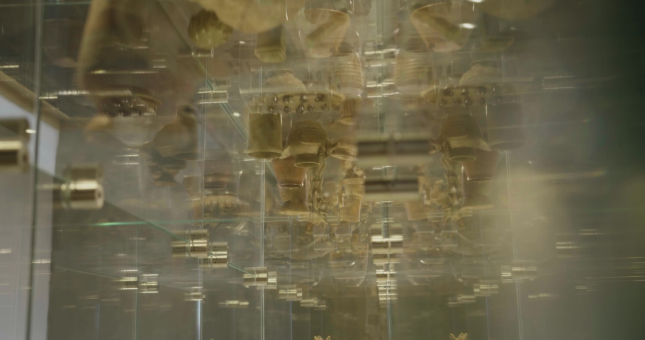 Ancient ceramic thinks in tableware reflected  display case