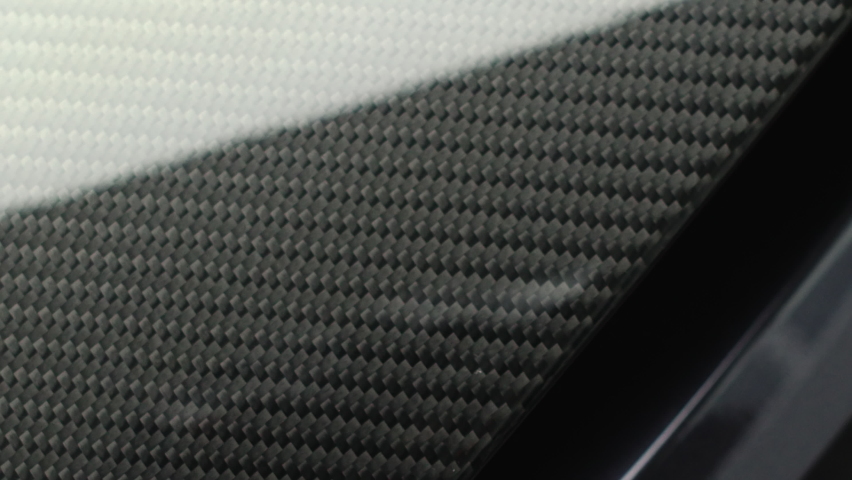 Carbon Fiber Rear Wing Of A 2-seater Expensive Supercar. - close up Royalty-Free Stock Footage #1087180121
