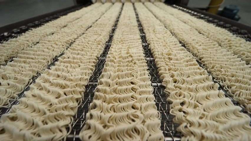 factory for the production of instant noodles. Fast food, vermicelli, pasta, noodle factory production line Royalty-Free Stock Footage #1087188038