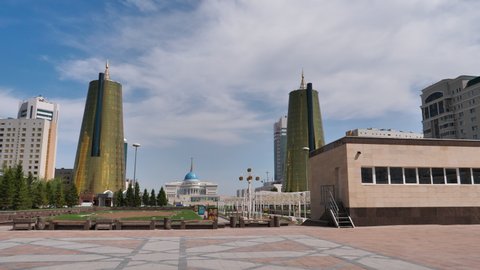 Nur-Sultan Astana MAY, 26, 2018: Skyscrapers at the administrative and cultural centre of Nur-Sultan Astana. Skyline of the city. Modern glass buildings. Nurzhol boulevard a round-shaped town square.