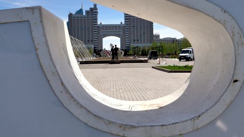 Nur-Sultan Astana MAY, 26, 2018: I love Astana installation. Closeup view. KazMunayGas Oil company in the background. Located in the capital of Kazakhstan. The camera moves backwards. Dolly shot.