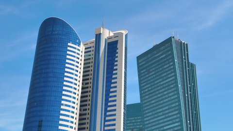 Nur-Sultan Astana MAY, 26, 2018: Skyscrapers at the administrative and cultural centre of Nur-Sultan Astana. Skyline of the city. Modern glass buildings. Nurzhol boulevard. 