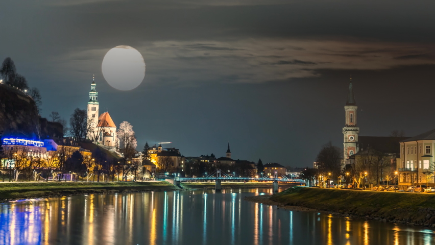 Salzburg skyline night view austria city, view of Salzburg austria from bridge old town view river and bridge castle church and cathedral.