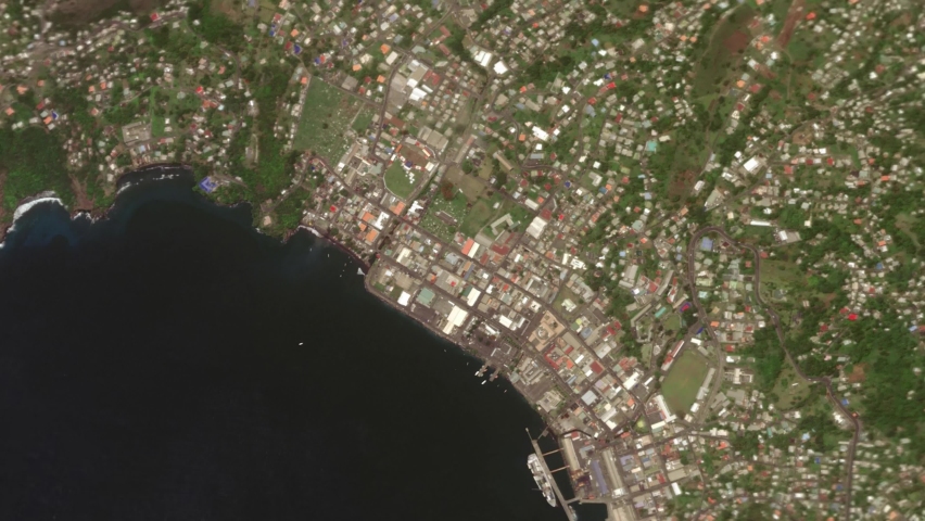 Earth zoom in from space and focus on St. Vincent, Kingstown. The animation continues by zoom out through clouds and atmosphere into space. Background for travel intro., a Business & Finance Video by BERMIX STUDIO