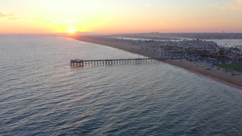 Aerial Zoom In Over Balboa Pier Newport Beach California at Sunset