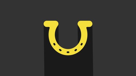 Yellow Horseshoe icon isolated on grey background. 4K Video motion graphic animation.