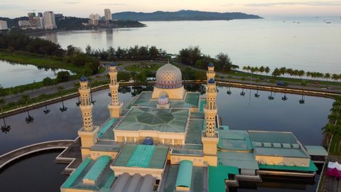 Kota Kinabalu City Mosque in Sabah, Borneo, Malaysia. The architecture and beautiful scenery of Likas bay and the beautiful lagoon make this mosque one of the main attractions of the city.