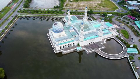 
Kota Kinabalu City Mosque in Sabah, Borneo, Malaysia aerial view with orbital drone movement