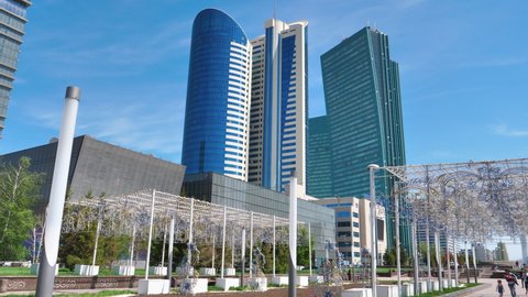 Nur-Sultan Astana MAY, 26, 2018: Skyscrapers at the administrative and cultural centre of Nur-Sultan Astana. Skyline of the city. Modern glass buildings. 