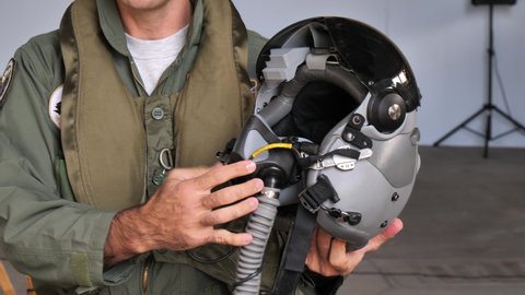 Gando Airport Gran Canaria Spain OCTOBER, 21, 2021 Helmet used by modern fighter pilots with oxygen tube and sun visor