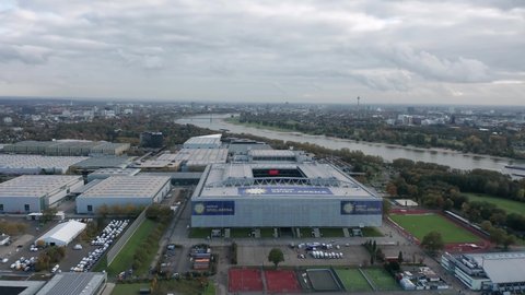 Dusseldorf, Germany - October 2021: Aerial panoramic view over Stockum commercial area: Merkur Spiel-Arena (home stadium for Fortuna Düsseldorf); Messe Dusseldorf exhibition centre