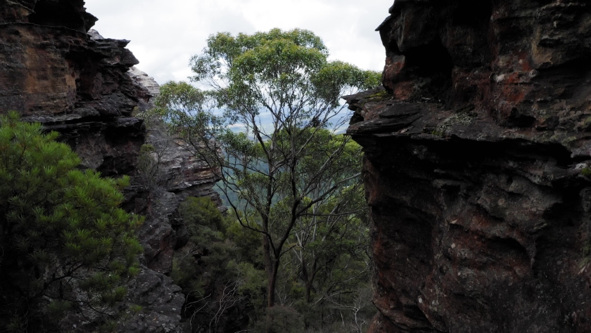 Drone aerial footage of a large valley and the nearby landscape near the town of Lithgow in the Central Tablelands area of New South Wales in Australia