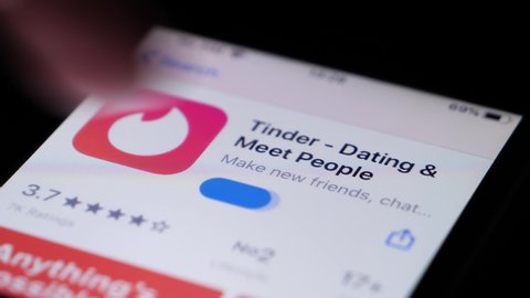BILTEN - FEBRUARY 17, 2022, installing Tinder, Dating and hook up app, close up