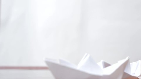 Five Paper Boats Surfing A Water Surface.
Five paper ship surfing the water for your travel and vacations projects or delivery topics in your footage. 