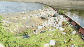 river pollution, Various waste and pollution in the barrier built on the river 